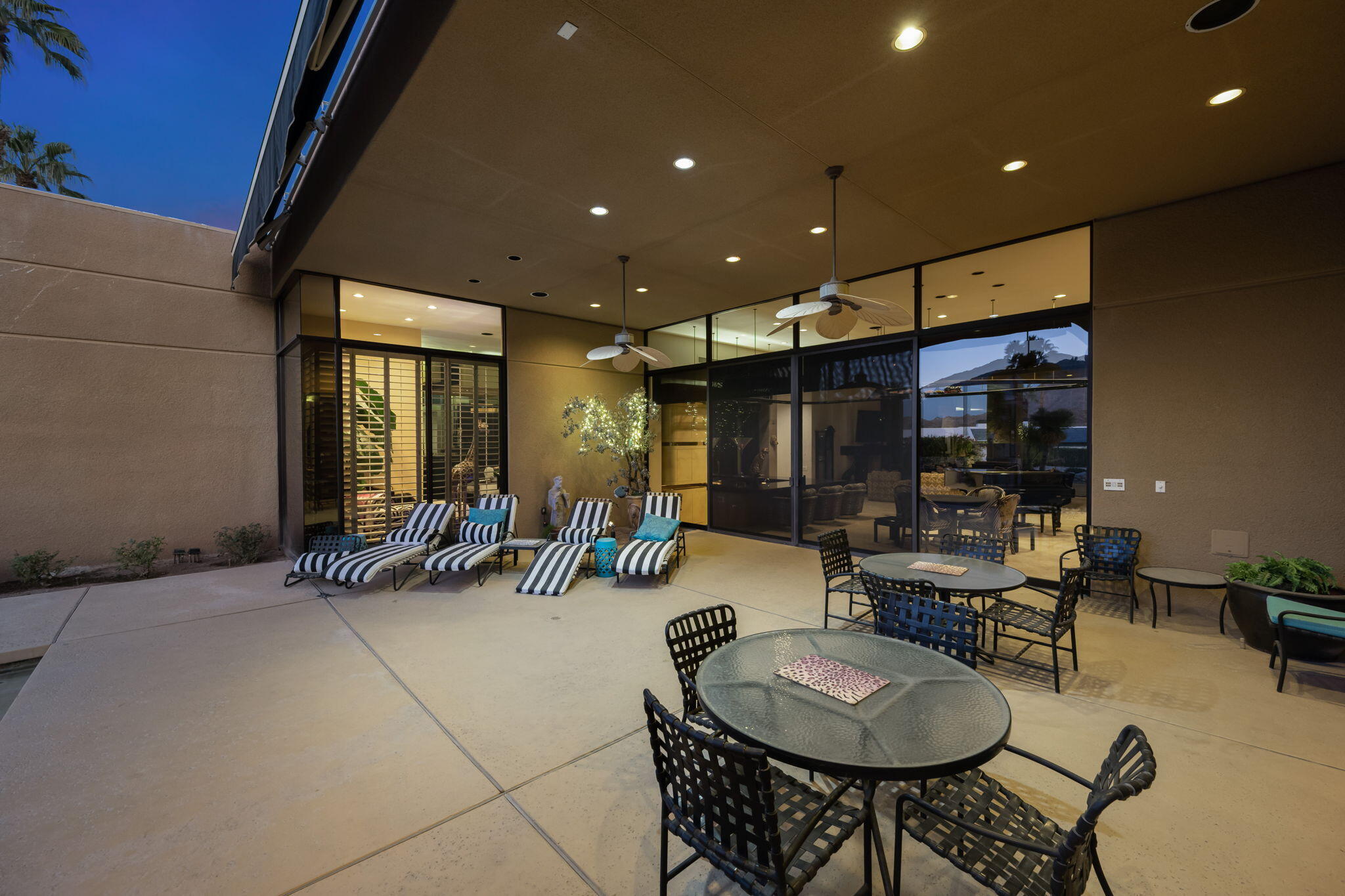 73380 Agave Lane Palm Desert, CA 92260 - Photo 75 of 81 a room with furniture and a potted plant