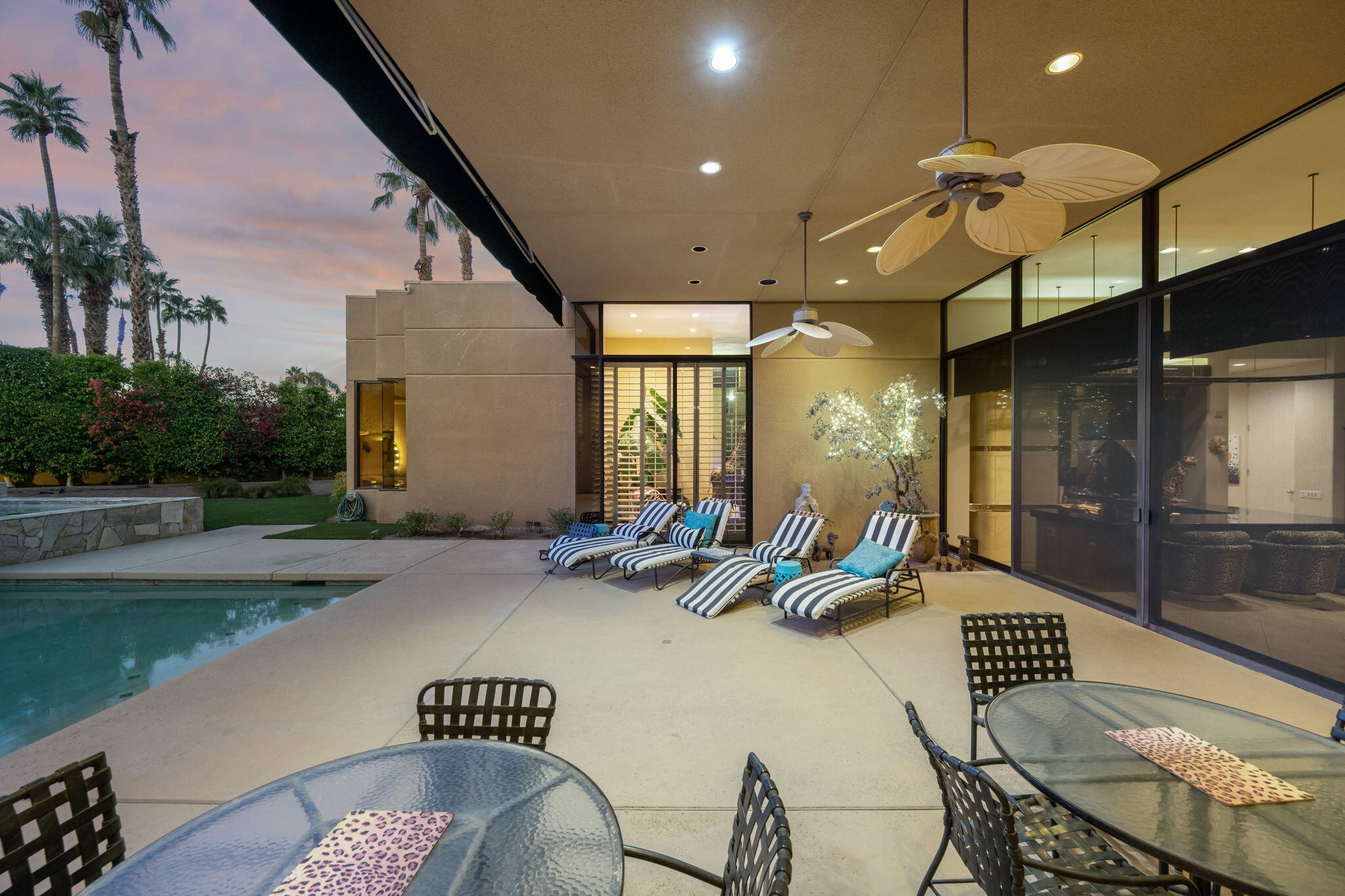 73380 Agave Lane Palm Desert, CA 92260 - Photo 76 of 81 a building outdoor space with patio furniture and potted plants