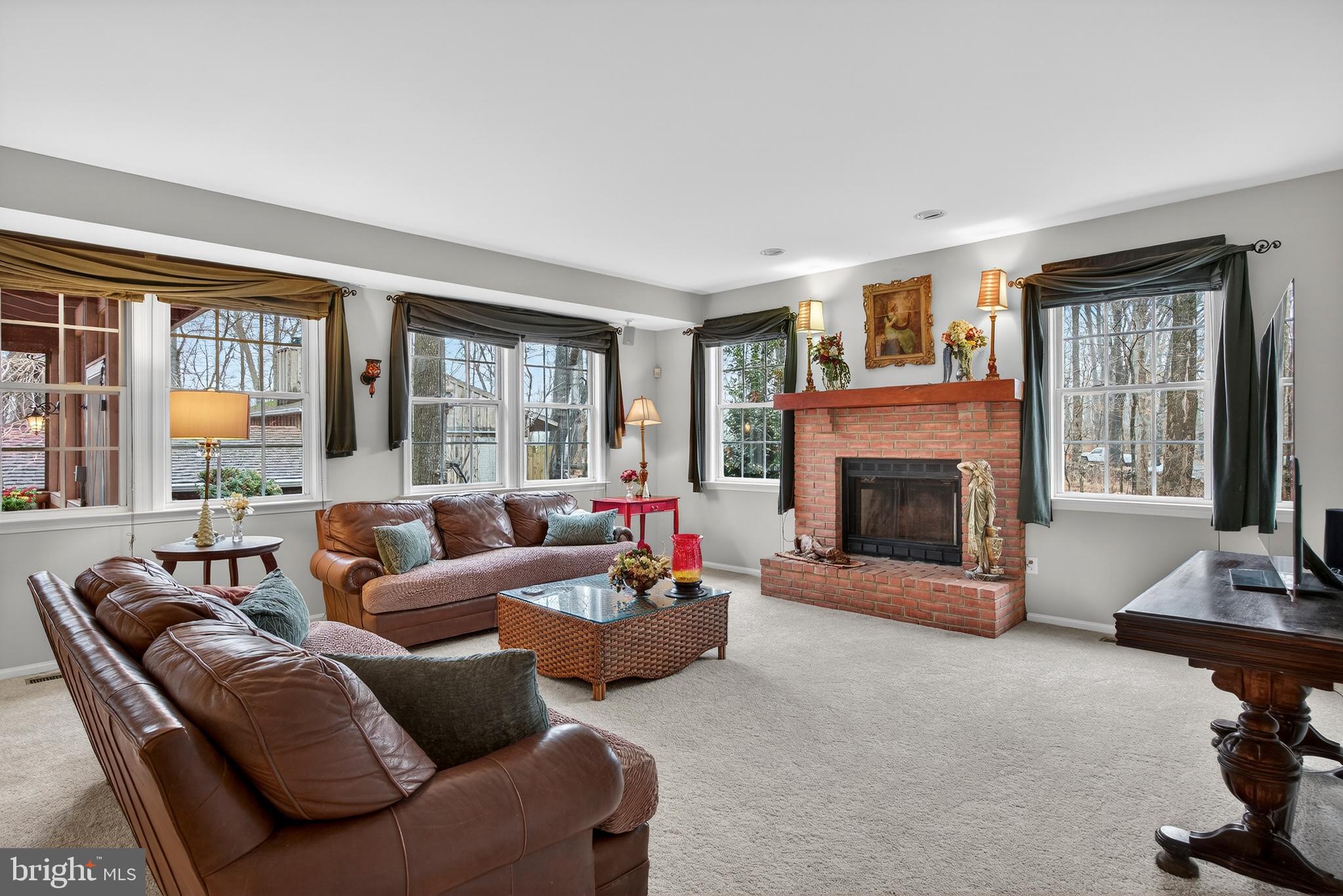 5777 White Rock Road Sykesville, MD 21784 - Photo 20 of 42 a living room with furniture and a fireplace