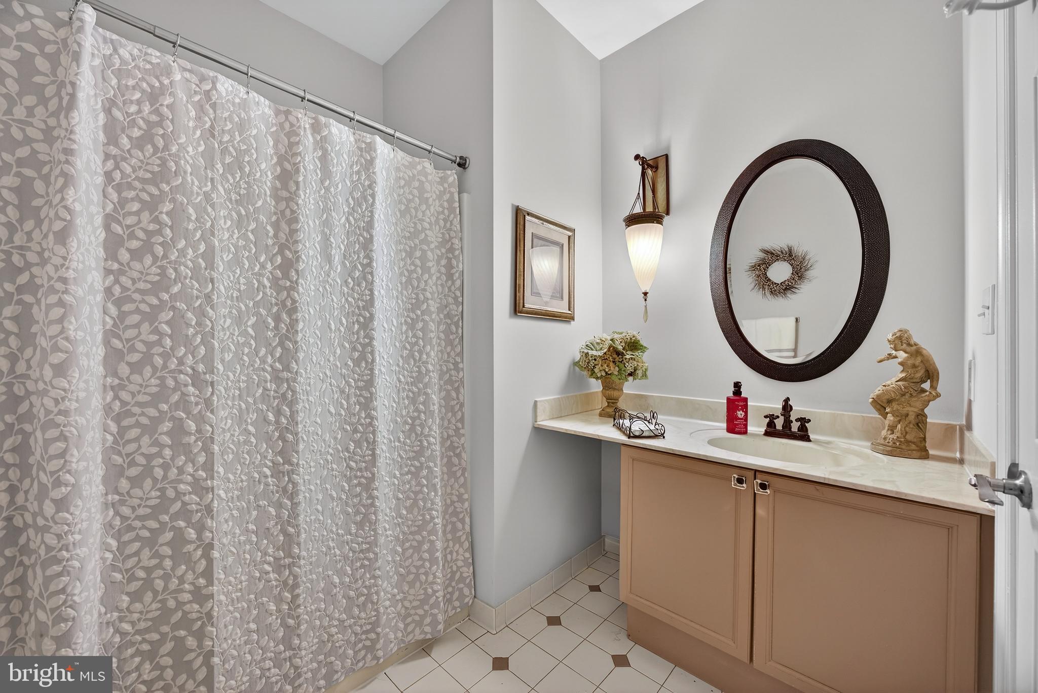 5777 White Rock Road Sykesville, MD 21784 - Photo 22 of 42 a bathroom with a sink vanity mirror and a toilet