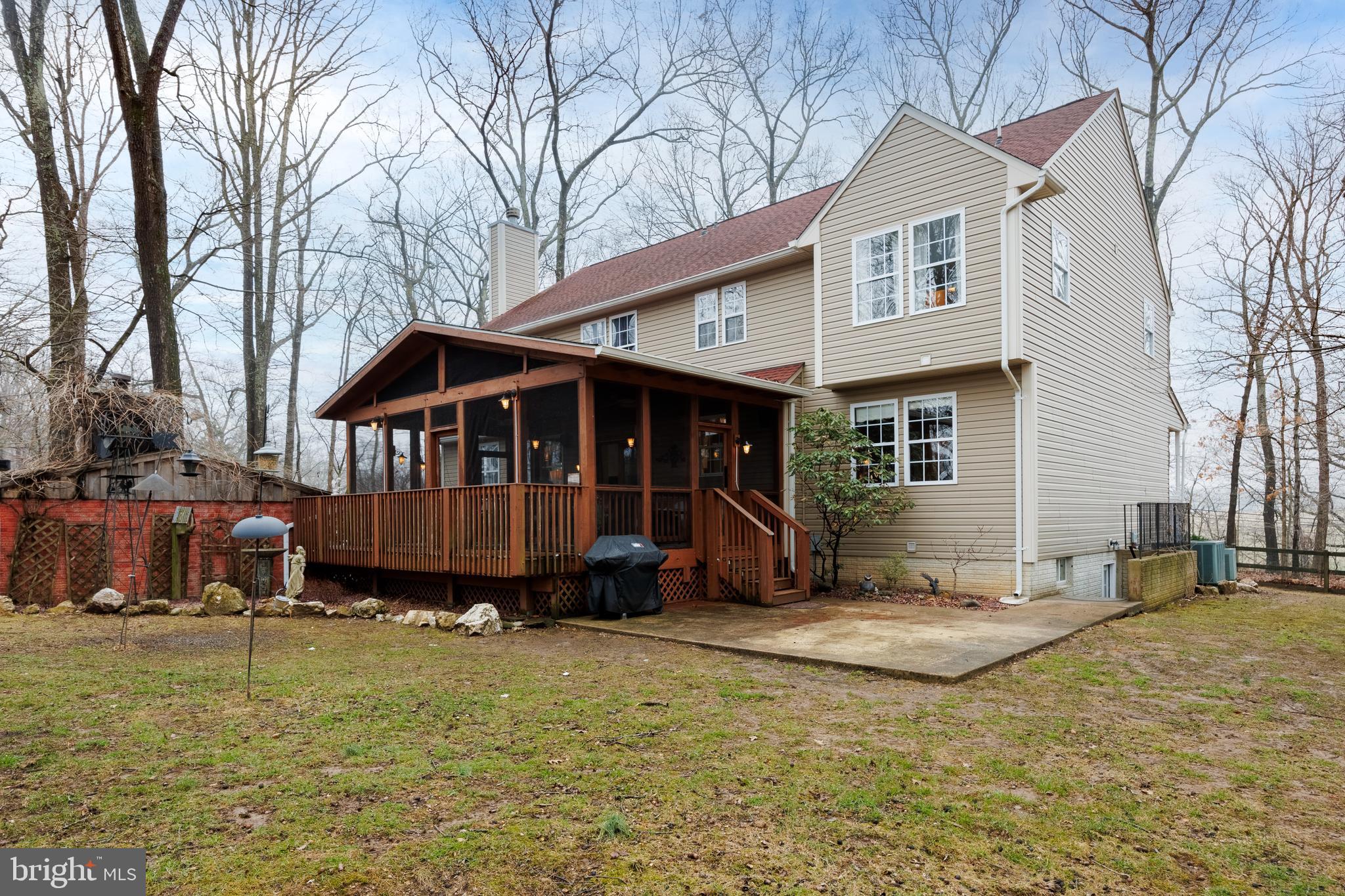 5777 White Rock Road Sykesville, MD 21784 - Photo 3 of 42 a view of a house with a yard patio and fire pit