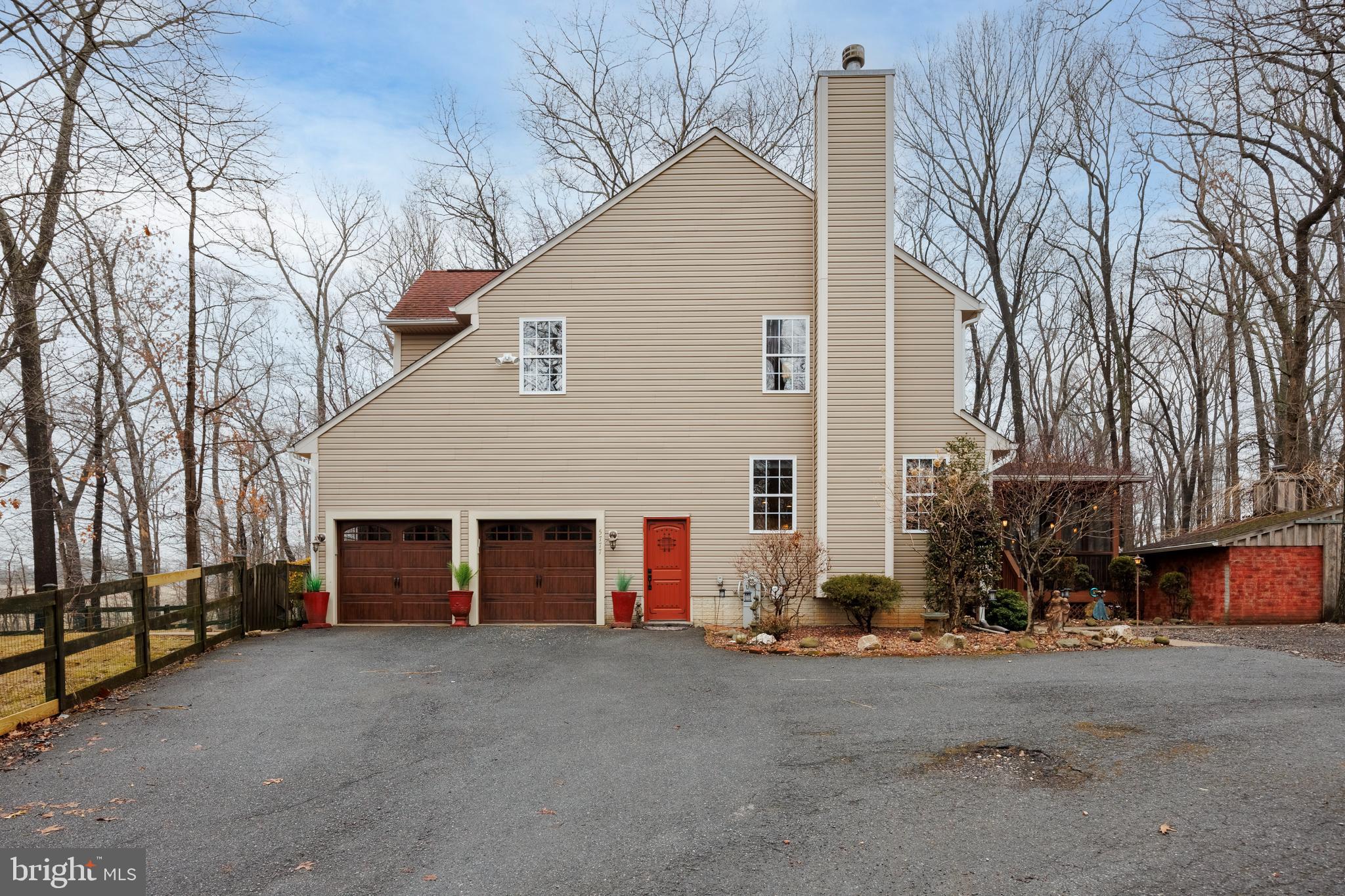 5777 White Rock Road Sykesville, MD 21784 - Photo 41 of 42 a view of a house with a yard and garage