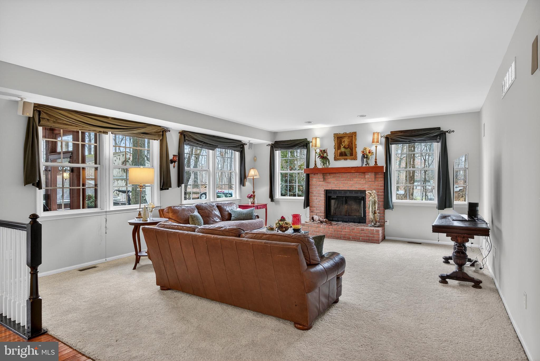 5777 White Rock Road Sykesville, MD 21784 - Photo 7 of 42 a living room with furniture and a fireplace