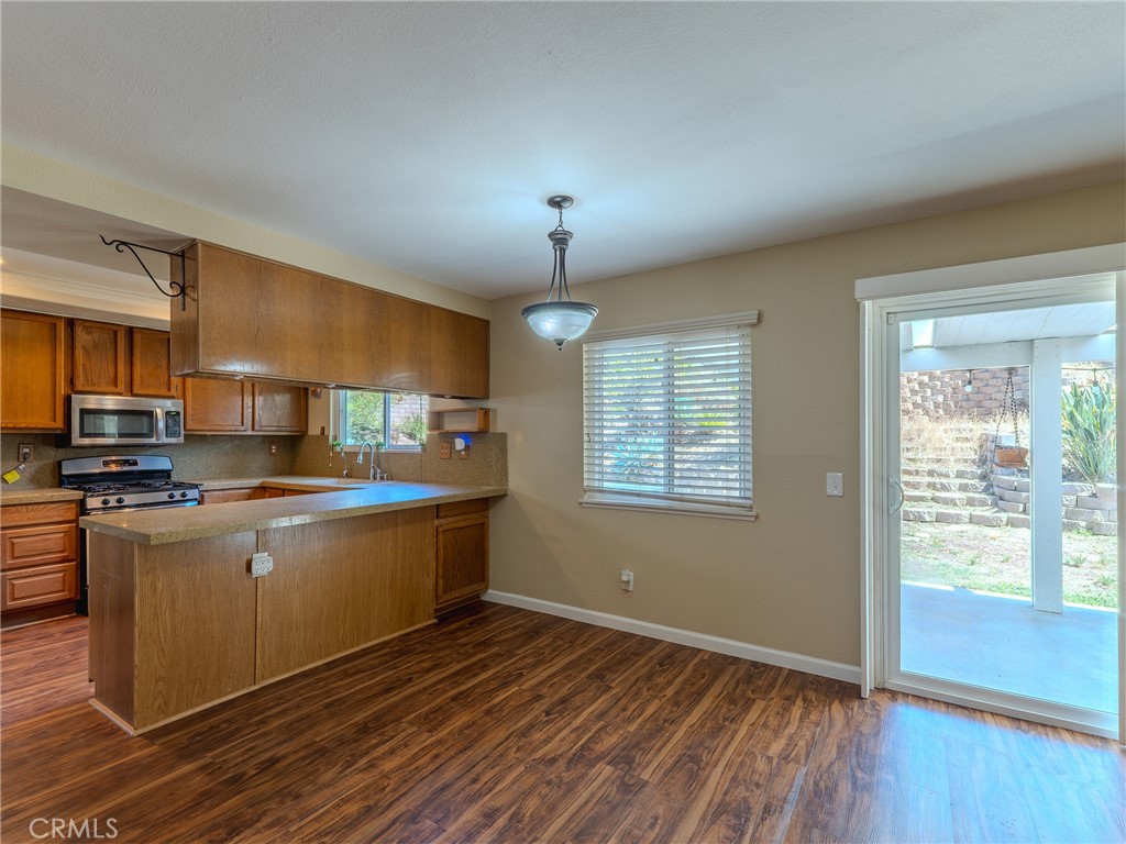 1302 Via Vista Riverside, CA 92506 - Photo 10 of 29 Dining nook transition to family, room