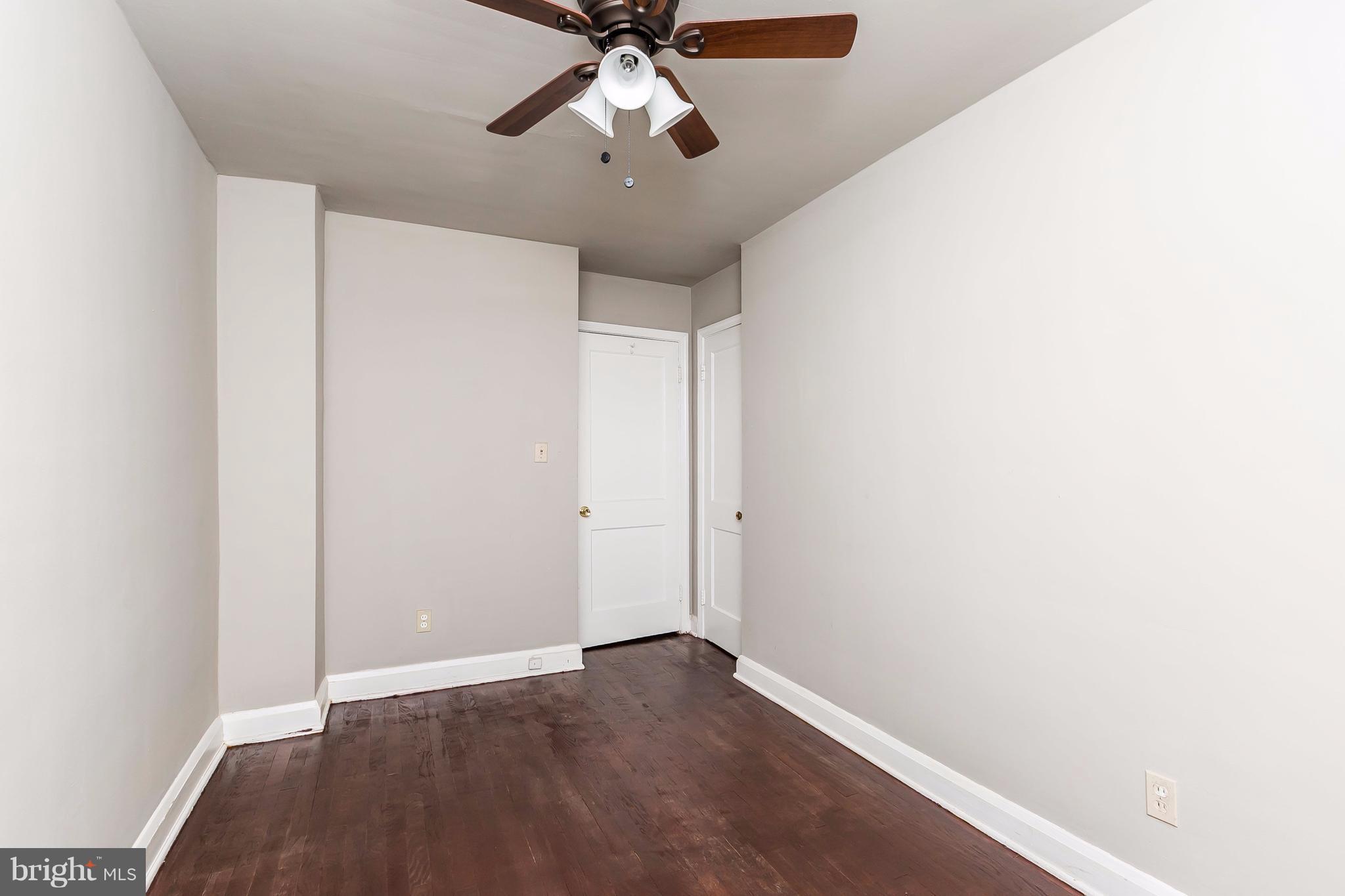 4016 Rexmere Road Baltimore, MD 21218 - Photo 14 of 26 a view of an empty room with a window
