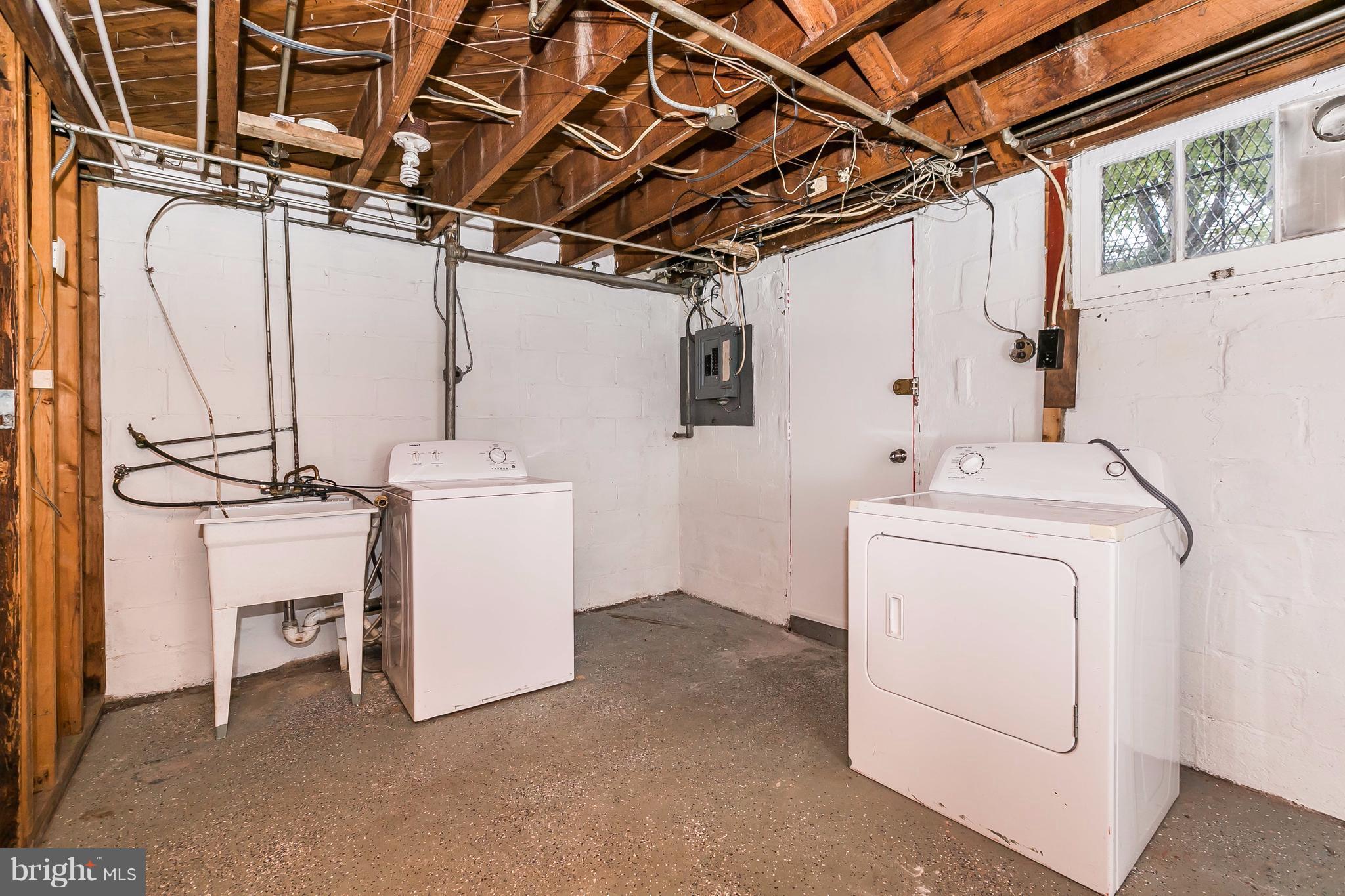 4016 Rexmere Road Baltimore, MD 21218 - Photo 20 of 26 a utility room with dryer and washer