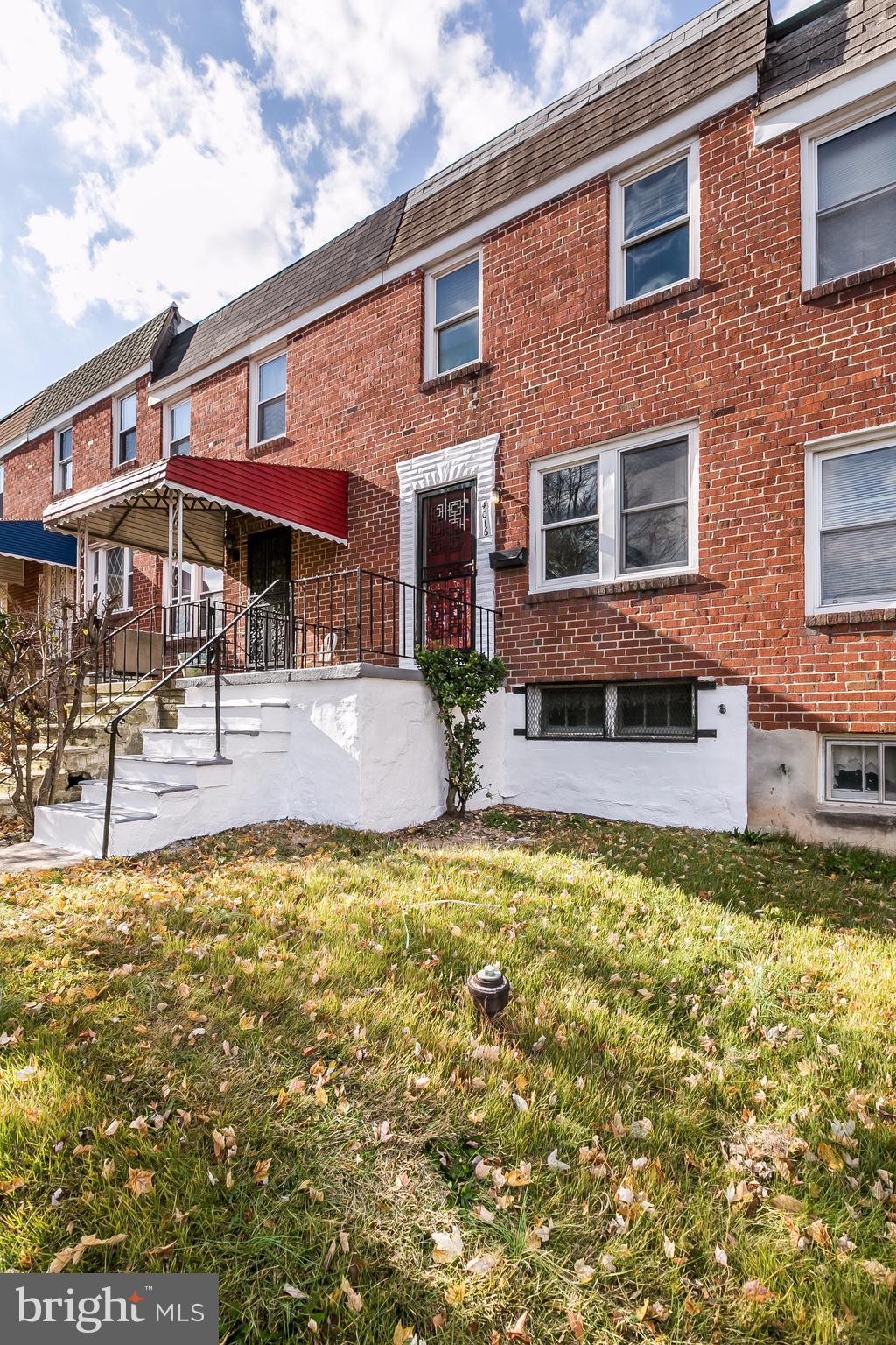 4016 Rexmere Road Baltimore, MD 21218 - Photo 26 of 26 a swimming pool with outdoor seating and yard
