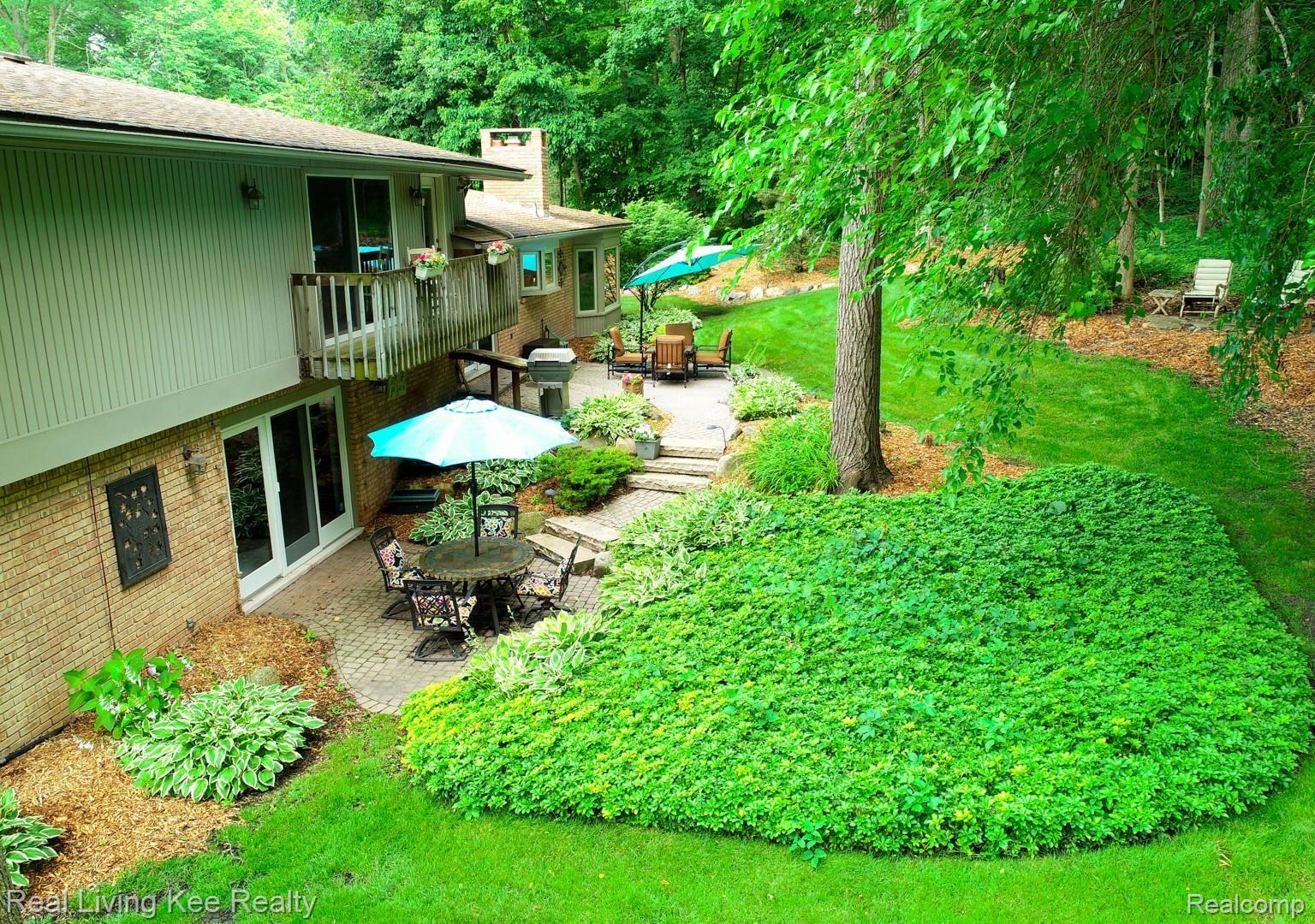 219 Beechview Drive Rochester, MI 48306 - Photo 55 of 64 Multi-tiered patio with perennial gardens