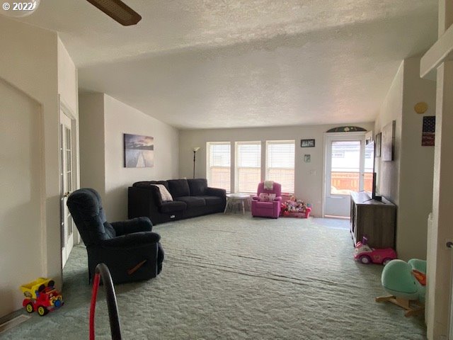 3425 Northeast Riverside Avenue Pendleton, OR 97801 - Photo 7 of 25 a living room with furniture chess board and a window
