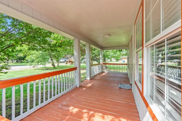 a view of a city street from a balcony