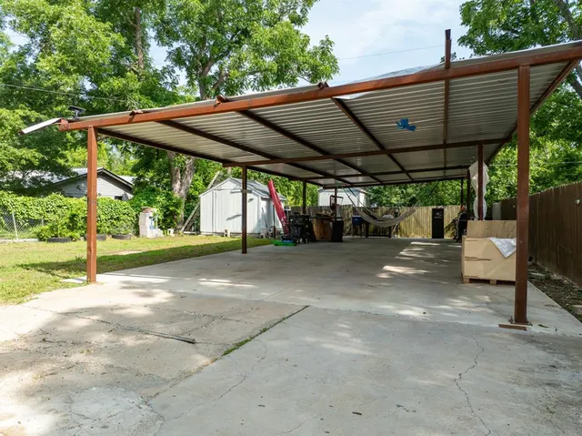 a front view of a house with trees