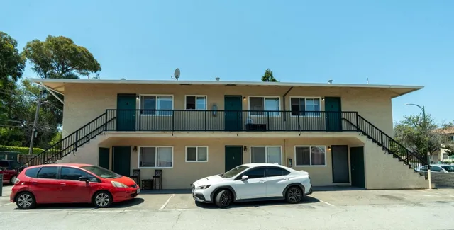 a car parked in front of a house