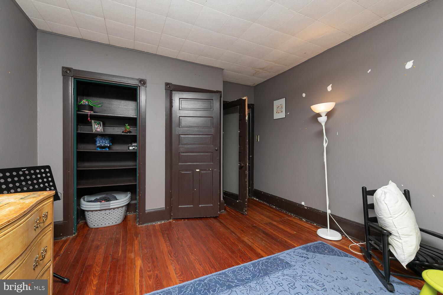 6705 Cresheim Road Philadelphia, PA 19119 - Photo 16 of 36 a room with walk in closet and wooden floor
