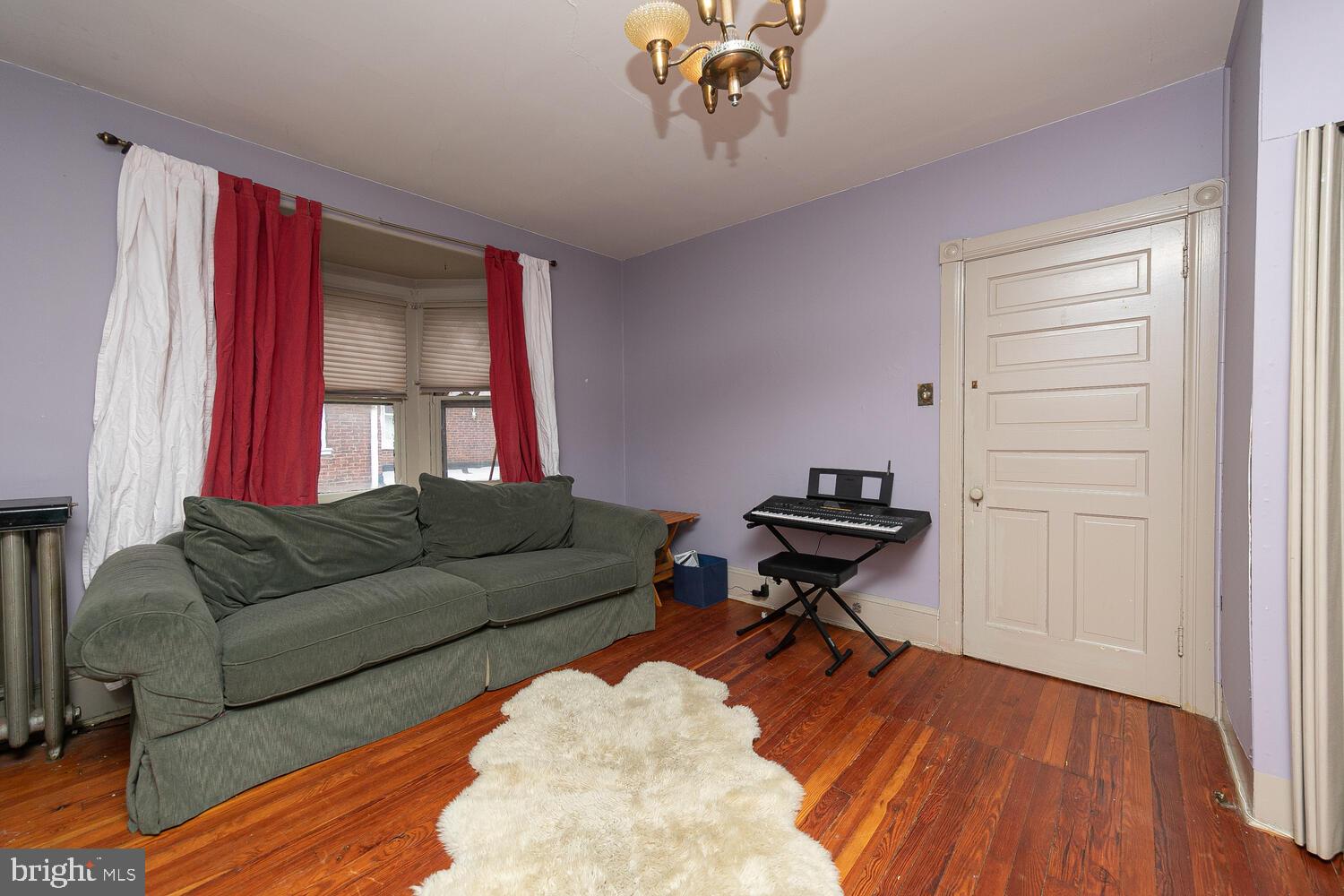6705 Cresheim Road Philadelphia, PA 19119 - Photo 17 of 36 a living room with furniture and a wooden floor