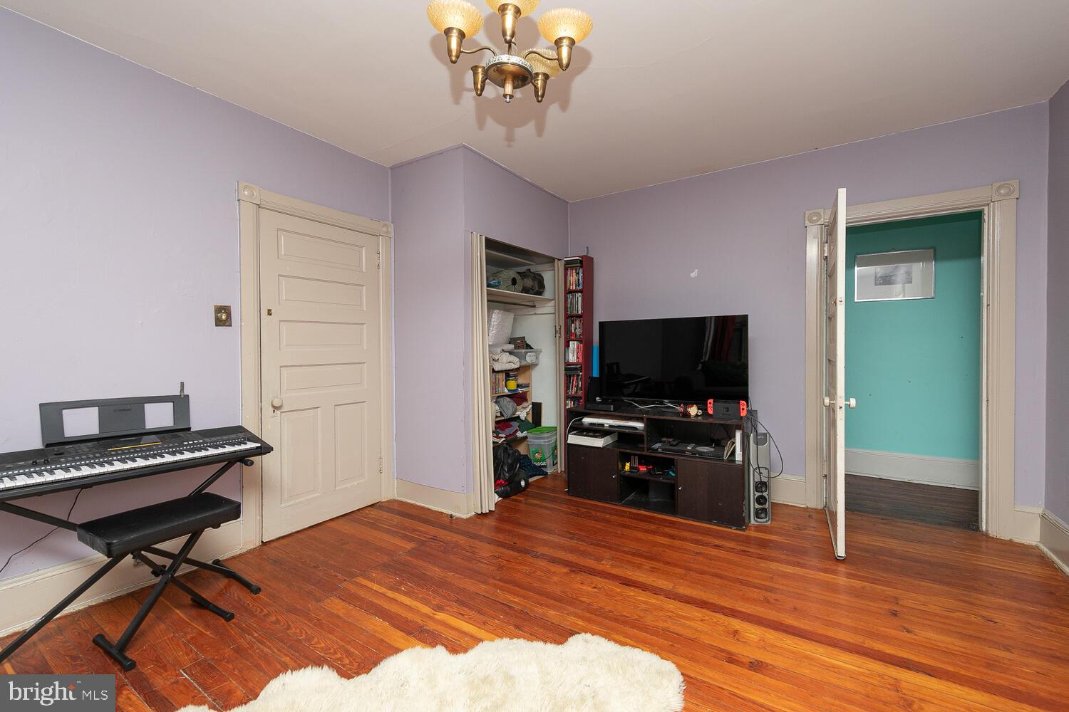 6705 Cresheim Road Philadelphia, PA 19119 - Photo 18 of 36 a bedroom with furniture and flat screen tv