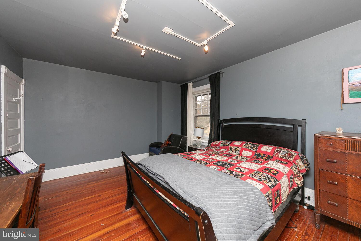 6705 Cresheim Road Philadelphia, PA 19119 - Photo 20 of 36 a bedroom with a bed and a dresser