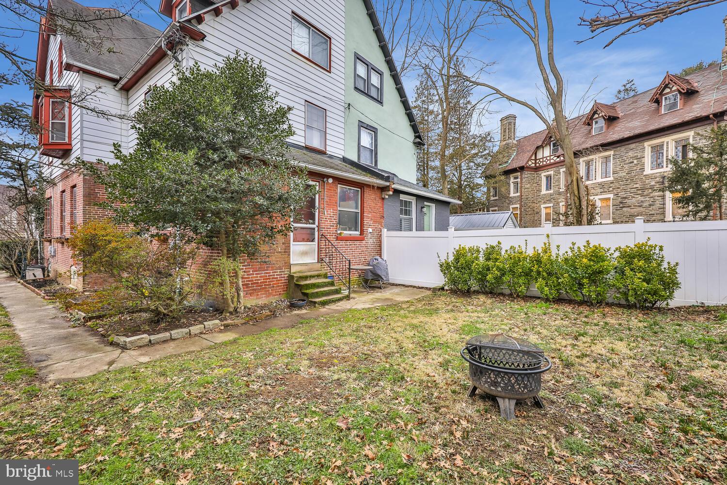 6705 Cresheim Road Philadelphia, PA 19119 - Photo 35 of 36 a backyard of a house with outdoor seating