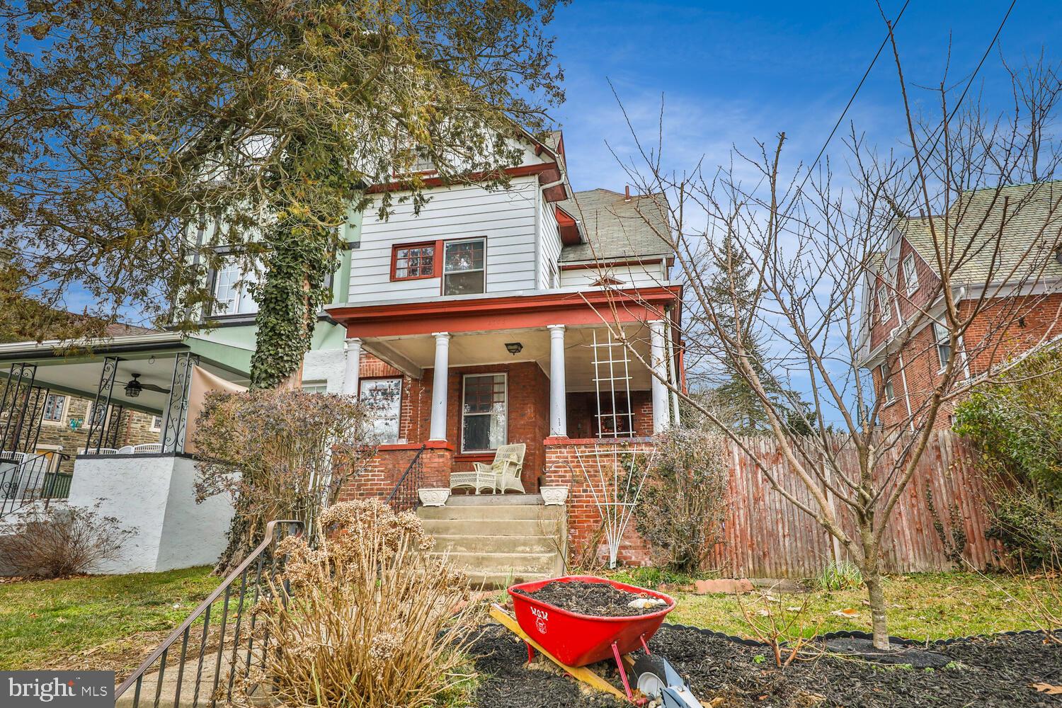 6705 Cresheim Road Philadelphia, PA 19119 - Photo 36 of 36 front view of a house with a yard