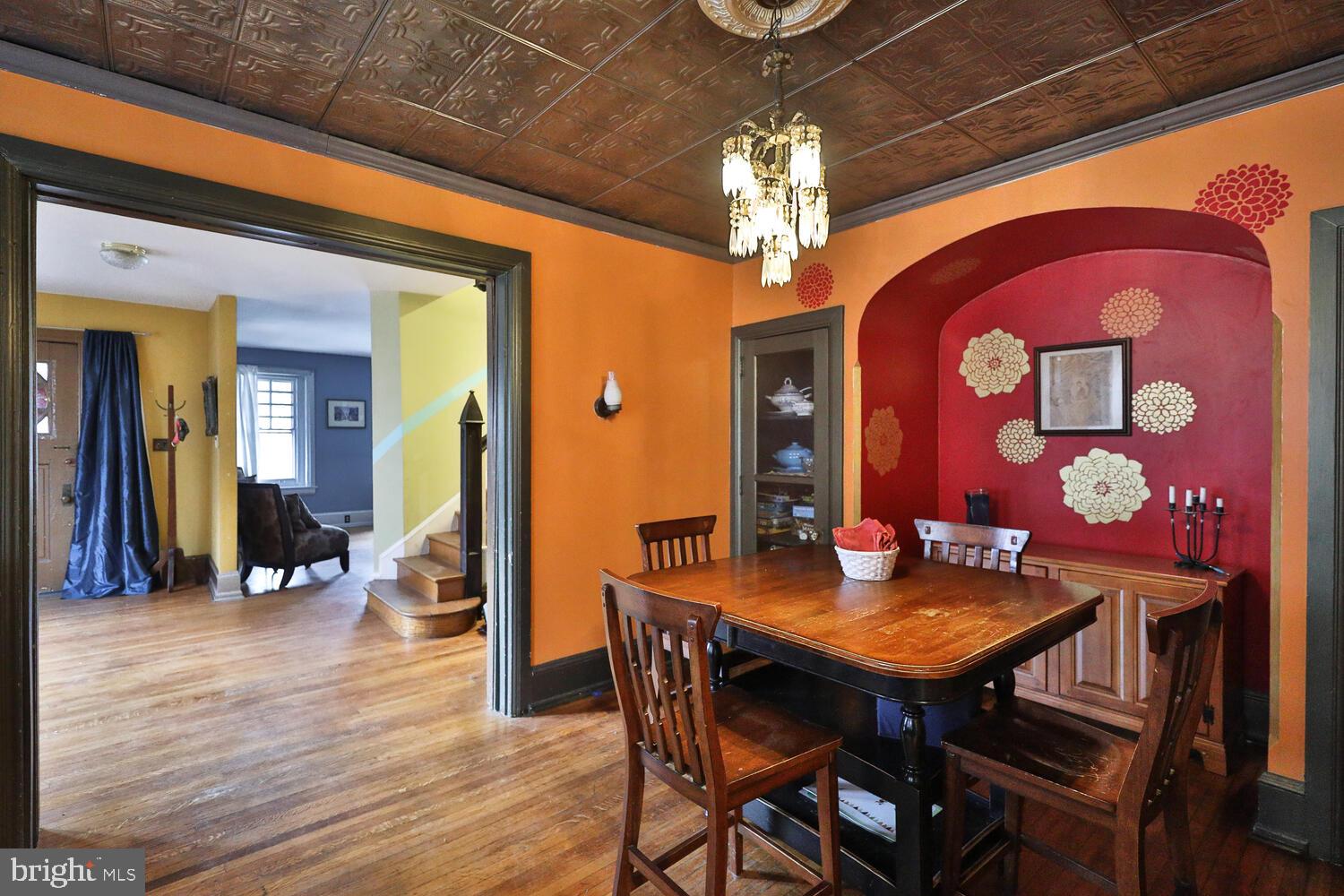 6705 Cresheim Road Philadelphia, PA 19119 - Photo 7 of 36 a view of a dining room with furniture and chandelier