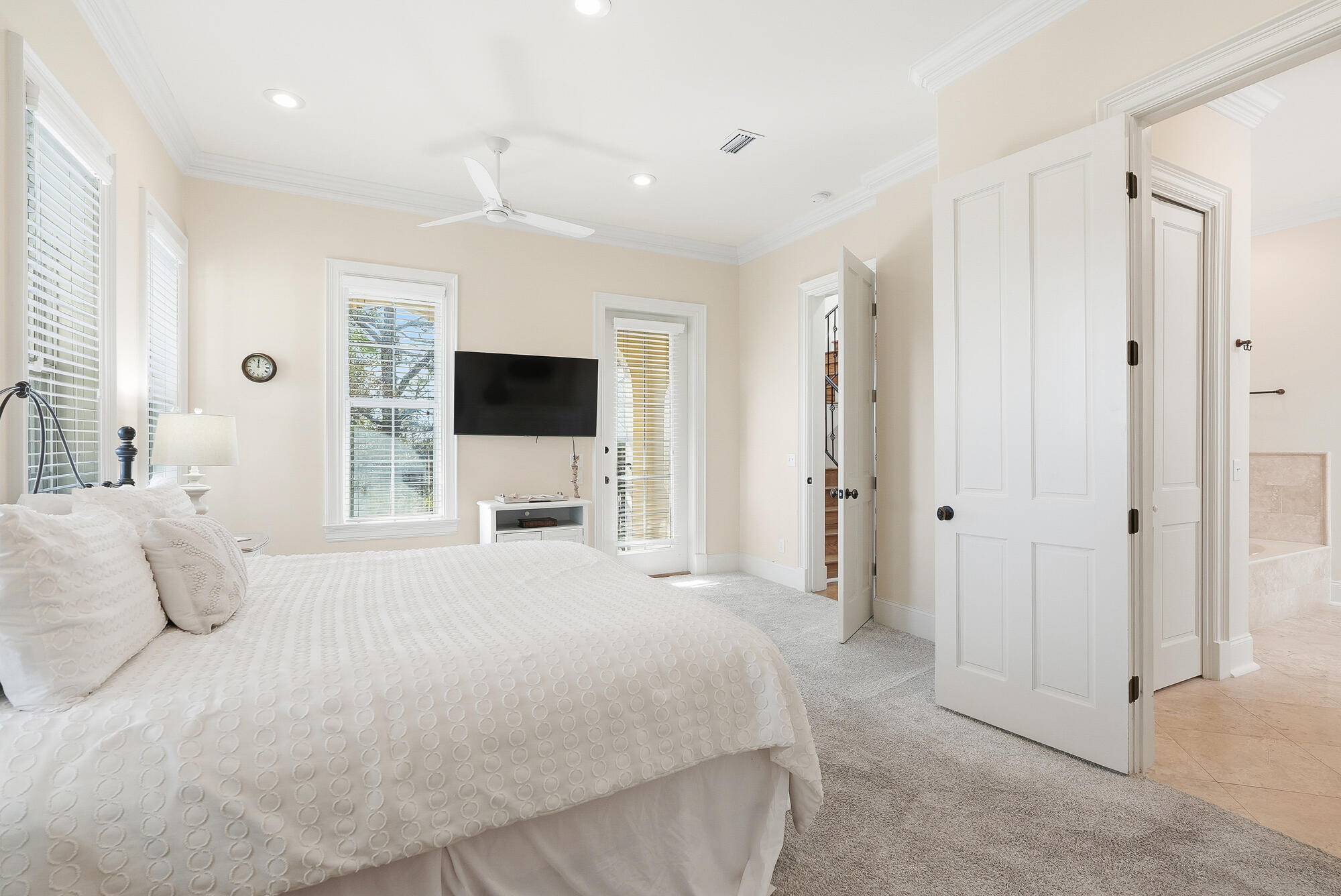 156 Palmeira Way Santa Rosa Beach, FL 32459 - Photo 18 of 58 a spacious bedroom with a bed and a flat screen tv