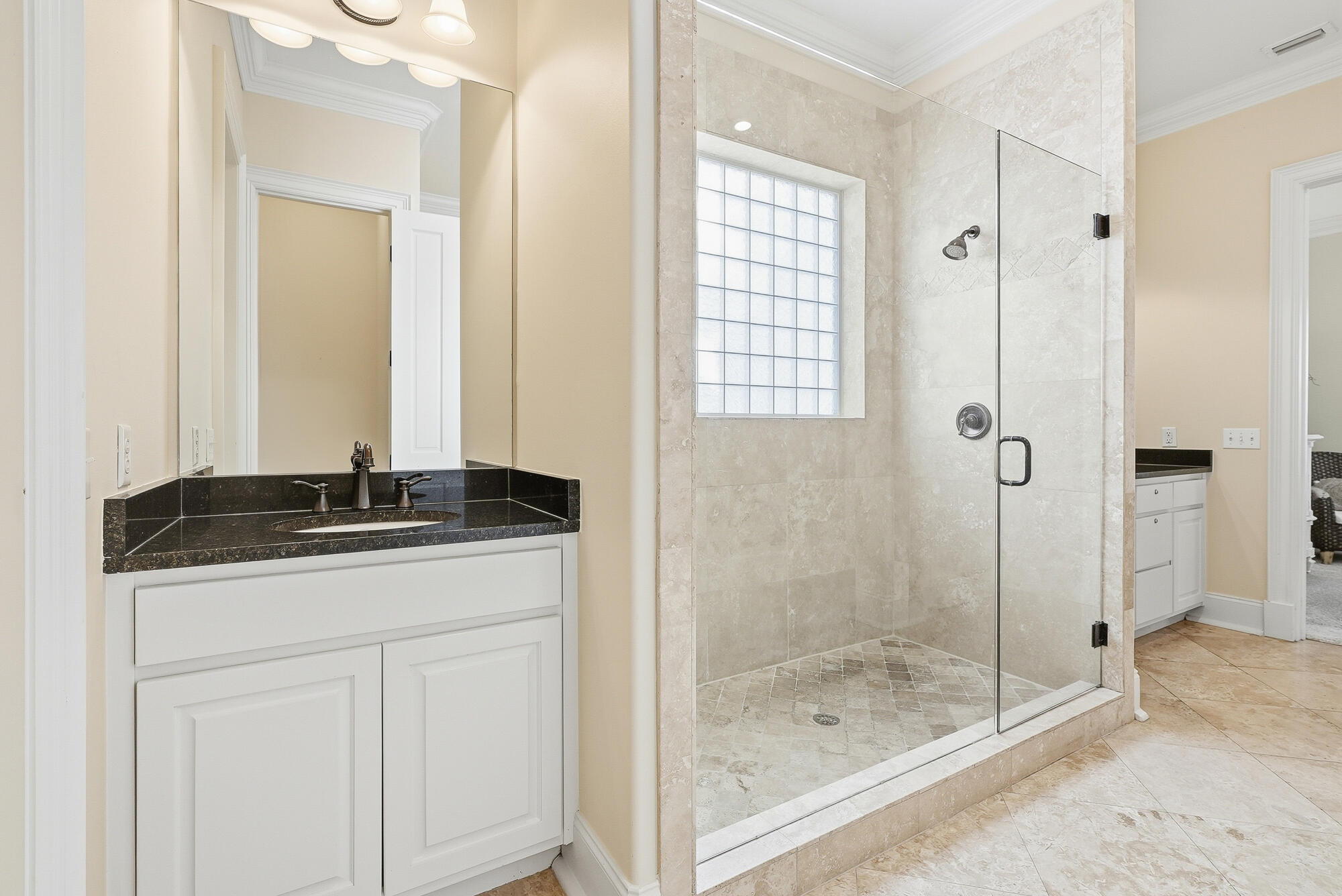 156 Palmeira Way Santa Rosa Beach, FL 32459 - Photo 20 of 58 a bathroom with a granite countertop sink a mirror and shower