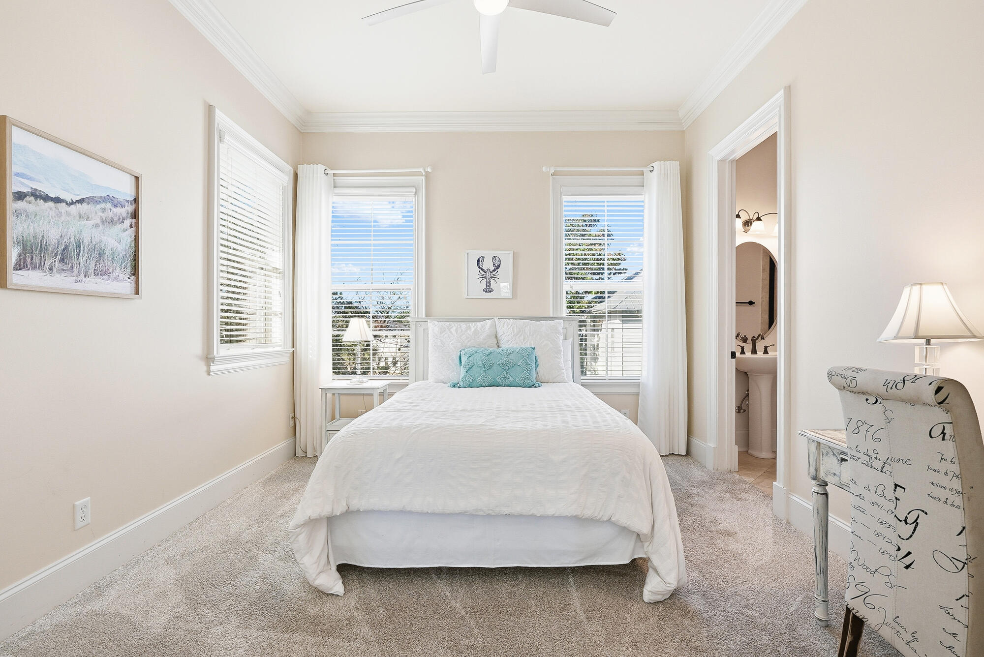 156 Palmeira Way Santa Rosa Beach, FL 32459 - Photo 25 of 58 a spacious bedroom with a bed and wooden floor