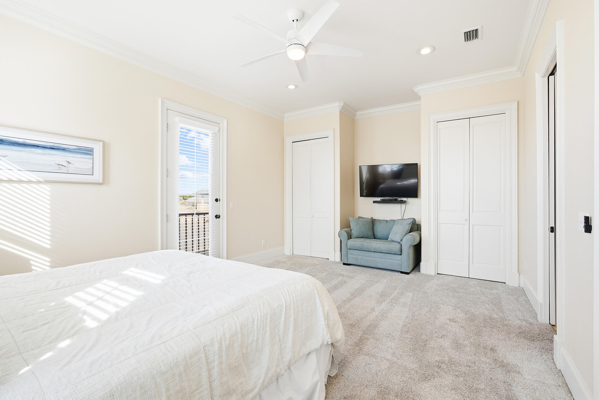 156 Palmeira Way Santa Rosa Beach, FL 32459 - Photo 31 of 58 a bedroom with a bed and a flat screen tv