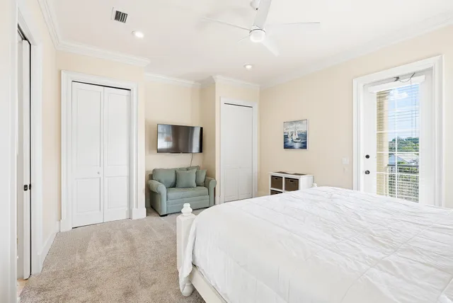 a view of a chairs and table in a balcony