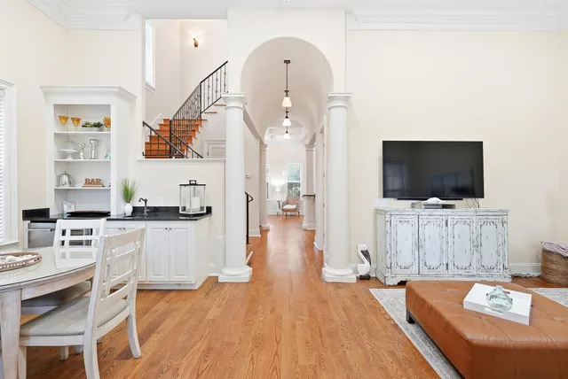 a living room with furniture or couch and a flat screen tv