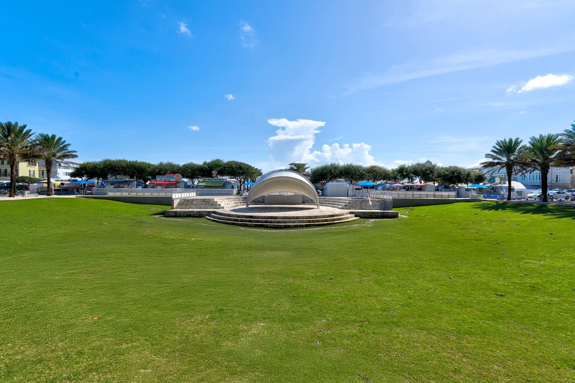 156 Palmeira Way Santa Rosa Beach, FL 32459 - Photo 53 of 58 a front view of a house with a yard table and chairs