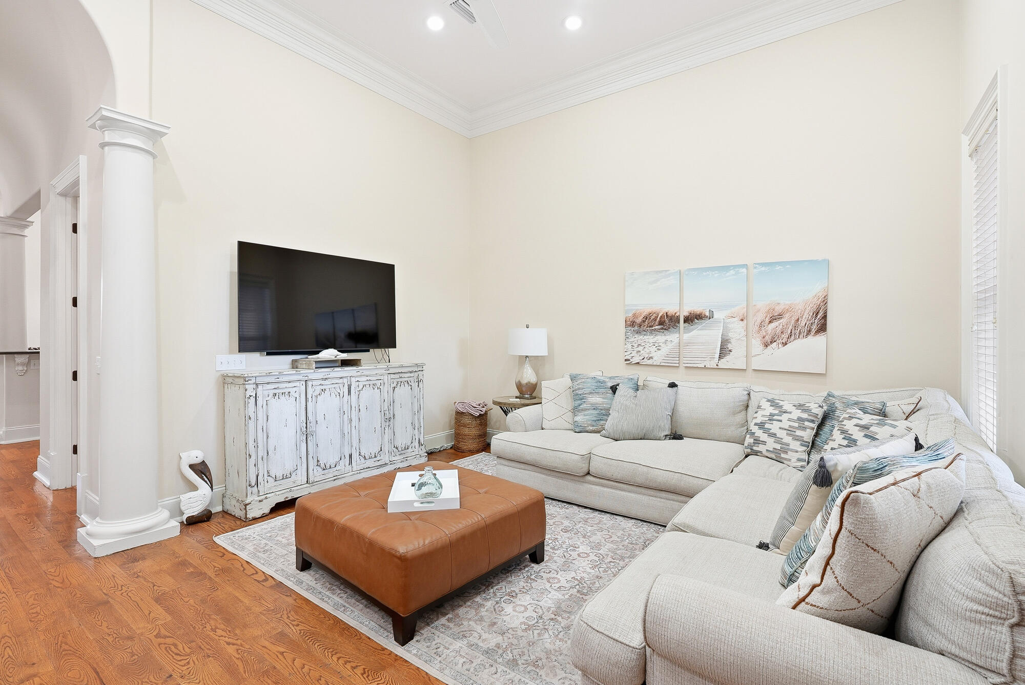 156 Palmeira Way Santa Rosa Beach, FL 32459 - Photo 6 of 58 a living room with furniture and a flat screen tv