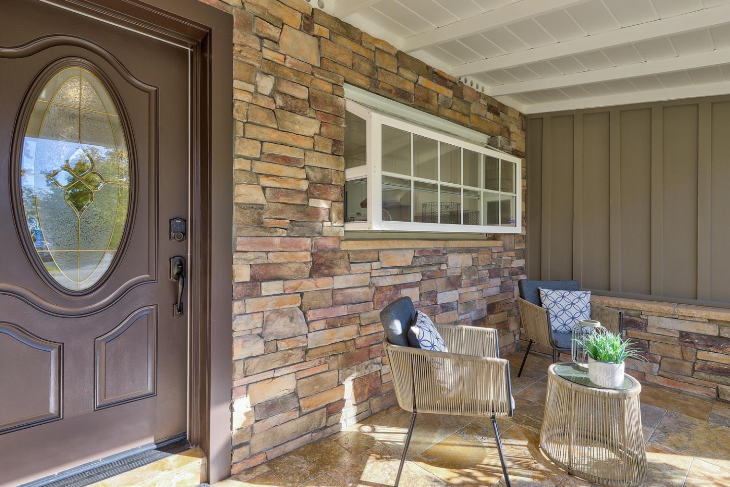 1445 Meadow Lane Mountain View, CA 94040 - Photo 2 of 33 a front view of a house with outdoor seating