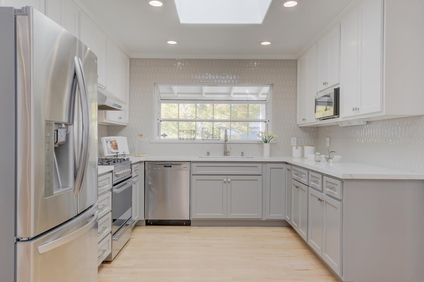 1445 Meadow Lane Mountain View, CA 94040 - Photo 11 of 33 a kitchen with stainless steel appliances granite countertop a refrigerator and a sink