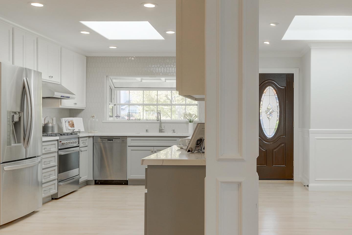 1445 Meadow Lane Mountain View, CA 94040 - Photo 15 of 33 a kitchen with a refrigerator sink and stove
