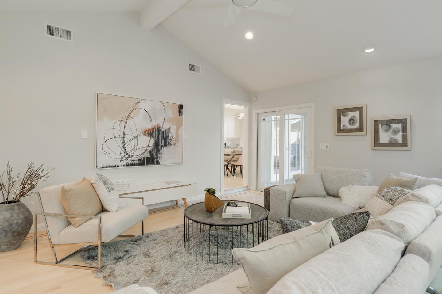 1445 Meadow Lane Mountain View, CA 94040 - Photo 17 of 33 a living room with furniture and a large window