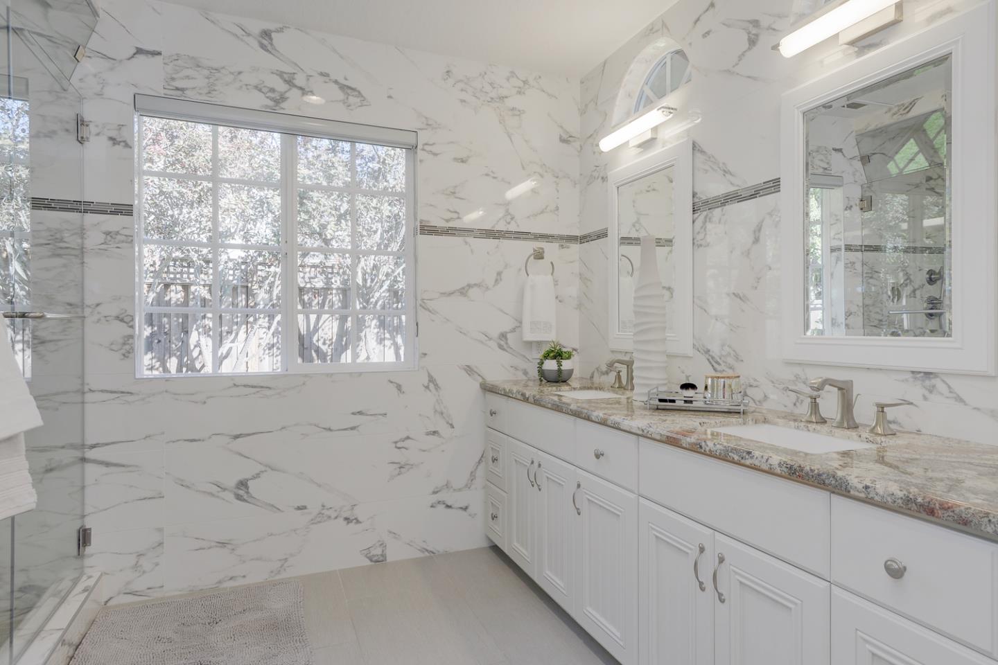 1445 Meadow Lane Mountain View, CA 94040 - Photo 19 of 33 a bathroom with a granite countertop sink mirror and a bathtub