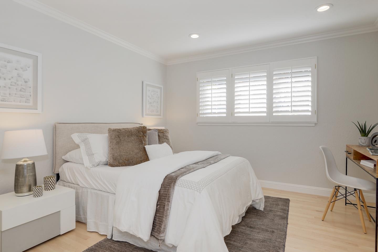 1445 Meadow Lane Mountain View, CA 94040 - Photo 22 of 33 a bedroom with a bed and wooden floor