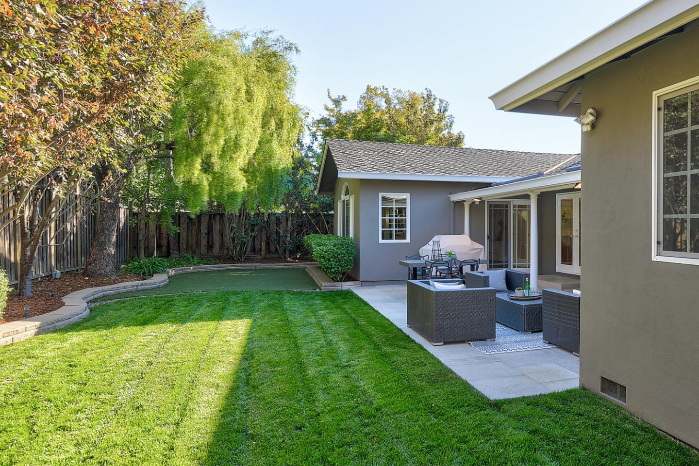 1445 Meadow Lane Mountain View, CA 94040 - Photo 29 of 33 a view of a chair and table in backyard of the house