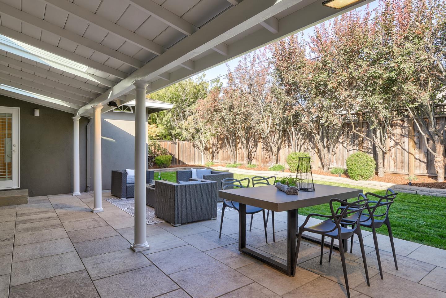 1445 Meadow Lane Mountain View, CA 94040 - Photo 32 of 33 a view of a patio with table and chairs and potted plants
