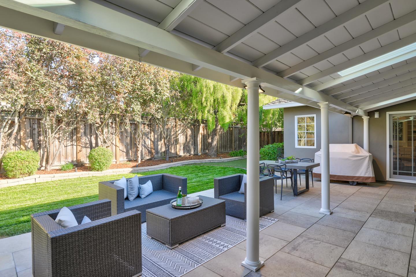 1445 Meadow Lane Mountain View, CA 94040 - Photo 33 of 33 a view of a patio with couches chairs and potted plants