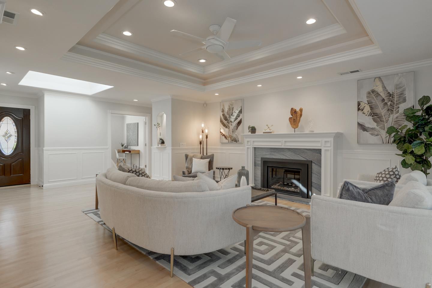 1445 Meadow Lane Mountain View, CA 94040 - Photo 7 of 33 a living room with furniture a fireplace and a potted plant