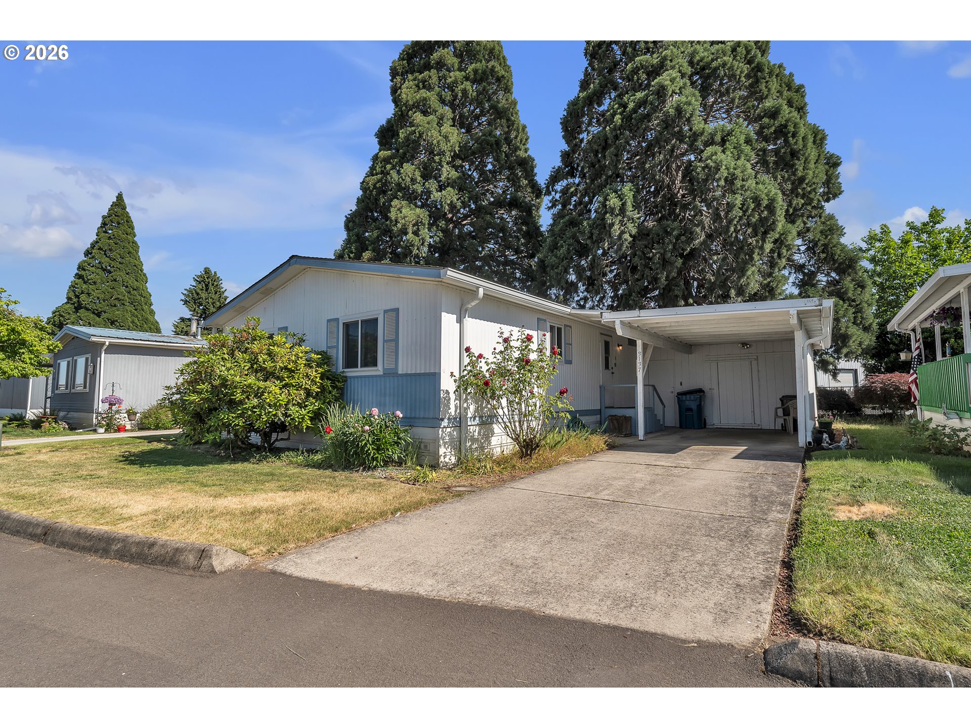 3137 Rainbow Loop Hubbard, OR 97032 - Photo 2 of 27 a view of a house with a patio
