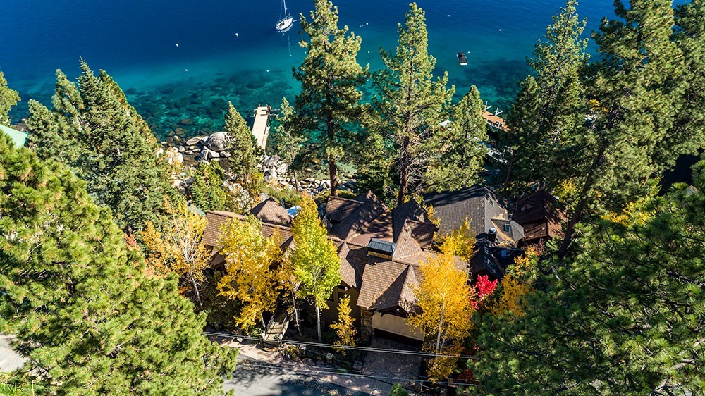 444 Gonowabie Road Crystal Bay, NV 89402 - Photo 2 of 35 a backyard of a house with lots of green space