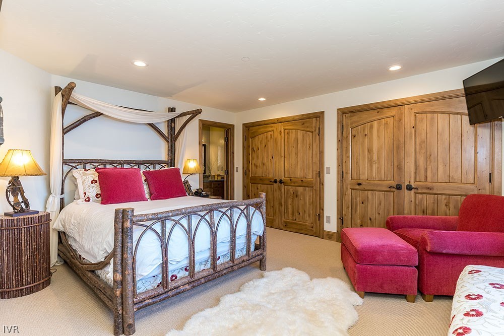 444 Gonowabie Road Crystal Bay, NV 89402 - Photo 24 of 35 a bedroom with a bed and a couch