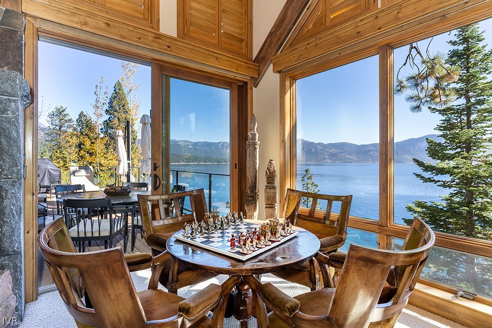 444 Gonowabie Road Crystal Bay, NV 89402 - Photo 6 of 35 a view of a balcony dining table and chairs