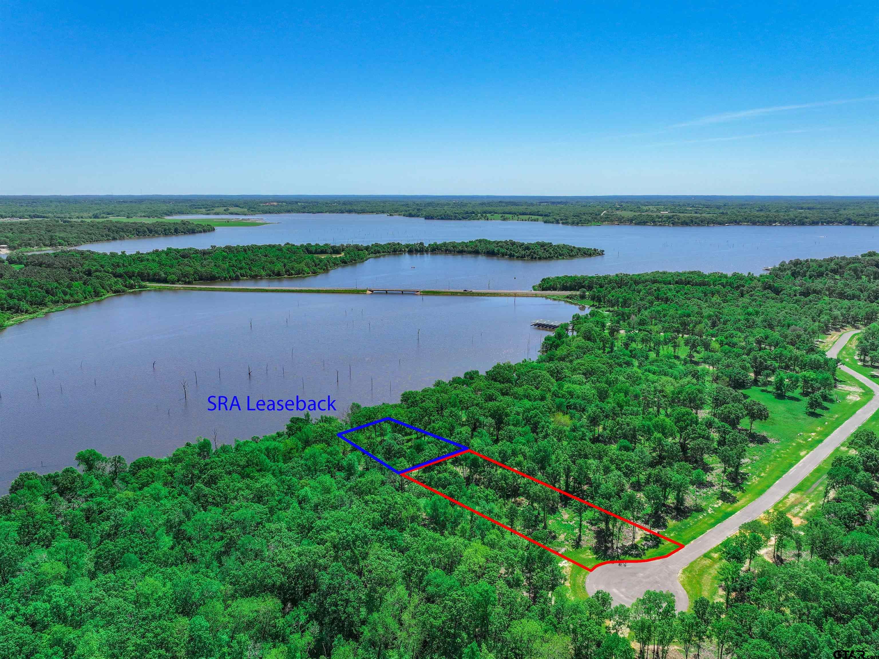 5862 Yantis Tx 75497 Yantis, TX 75497 - Photo 5 of 23 a view of a lake with a big yard