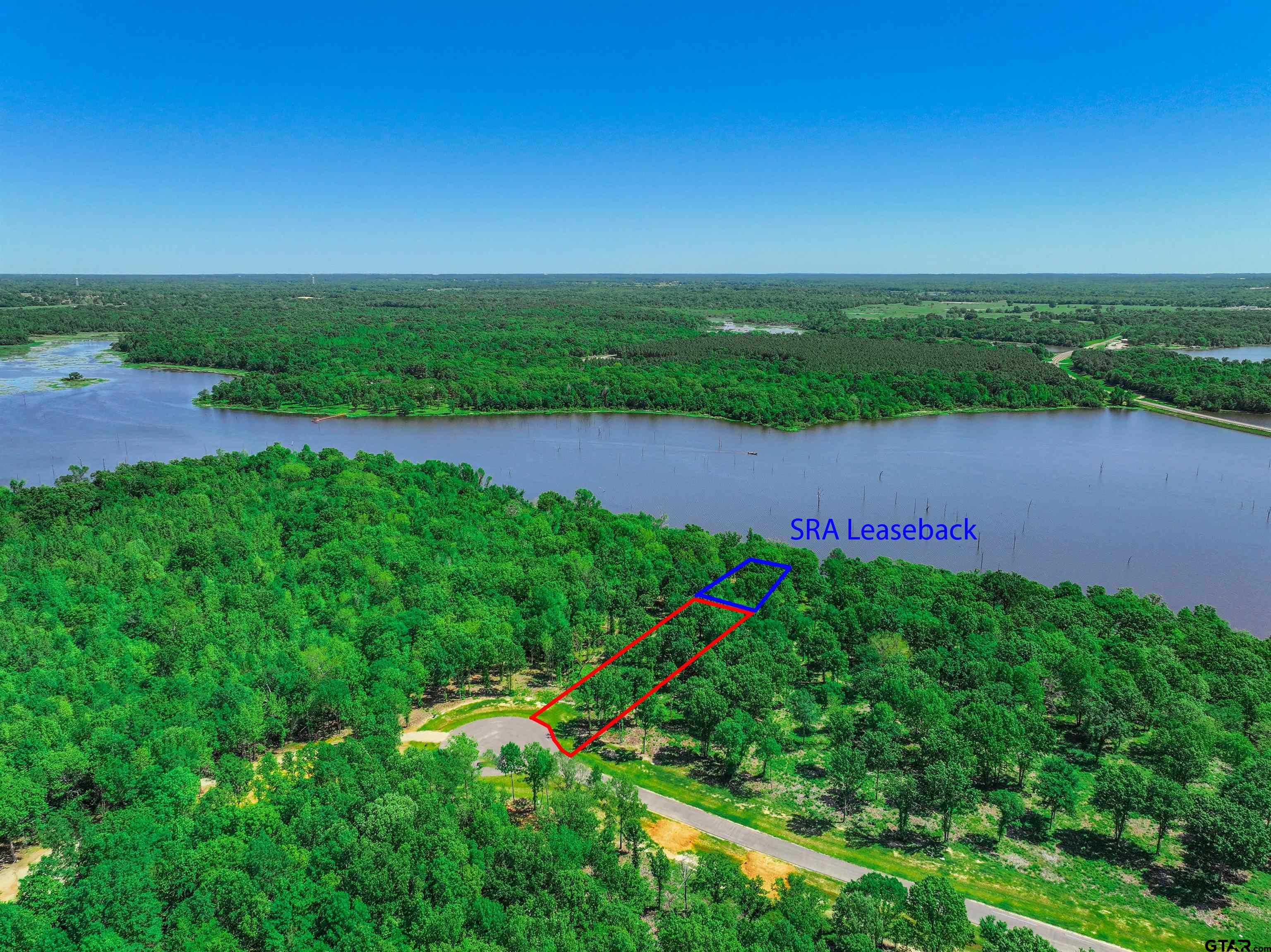 5862 Yantis Tx 75497 Yantis, TX 75497 - Photo 7 of 23 a view of a lake with a city