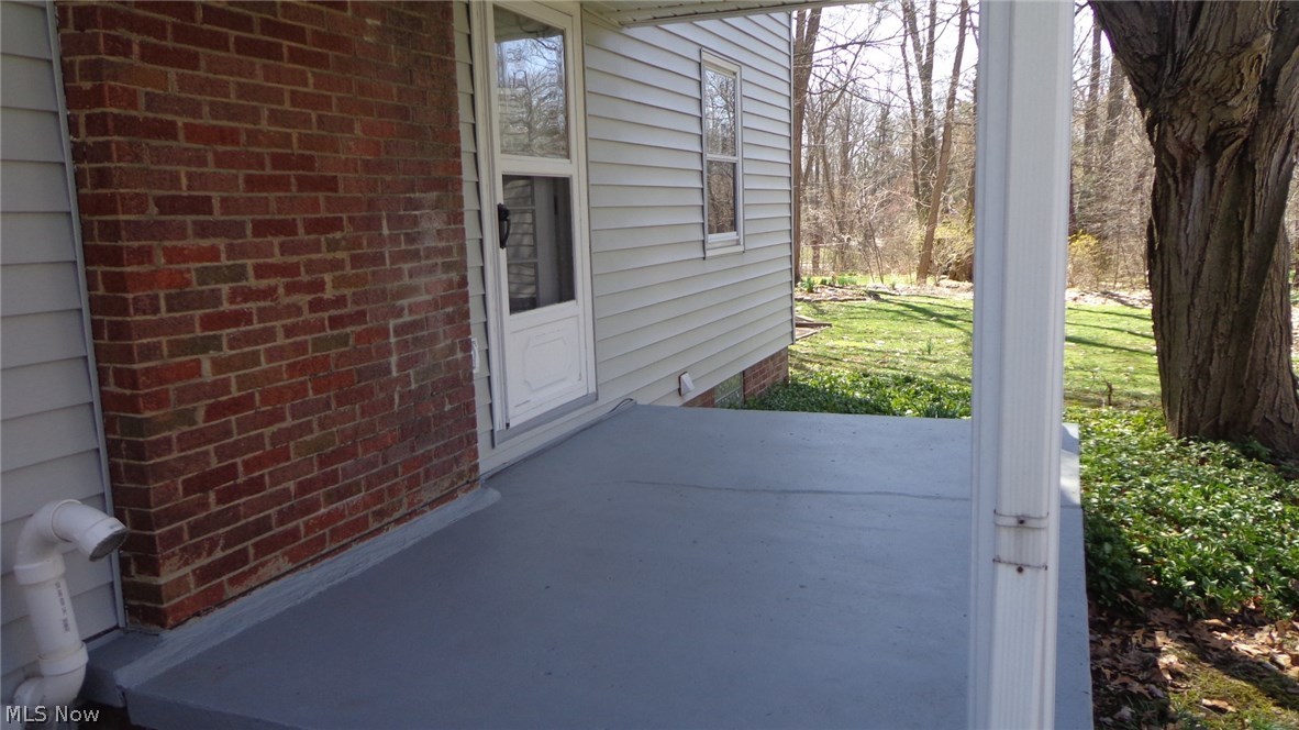1484 Graham Road Silver Lake, OH 44224 - Photo 30 of 33 Side Porch. Door lead to living room