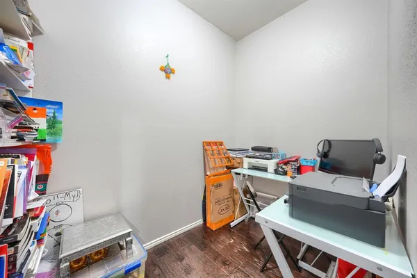 a room with furniture and a wooden floor