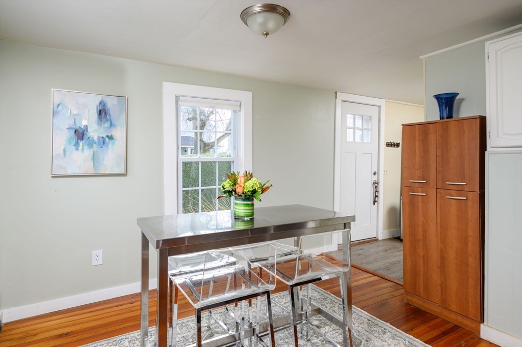 134 Hampton Circle Hull, MA 02045 - Photo 11 of 41 a dining room with furniture and window